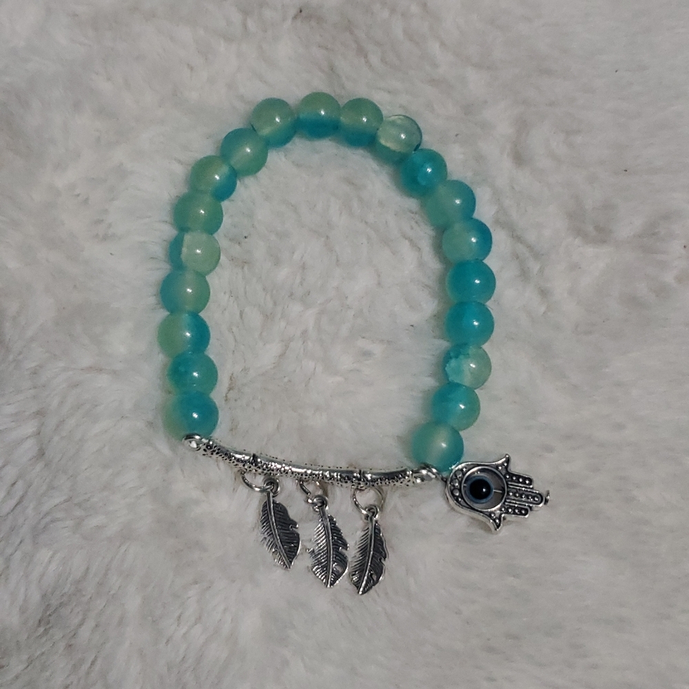 Silver and Blue Beaded Bracelet with Charms